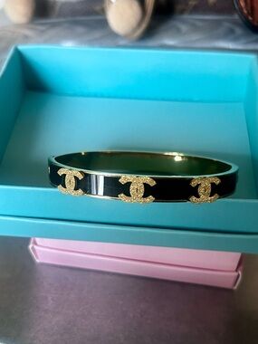 Gold-Tone Logo Accent Black Enamel Bangle Bracelet